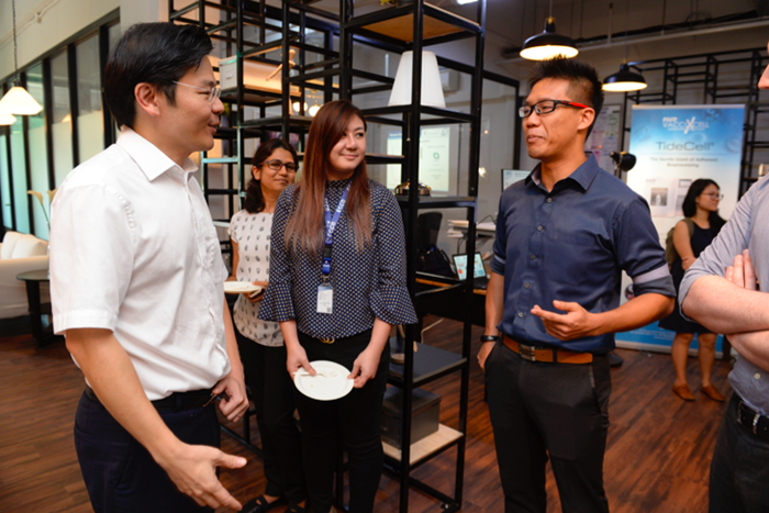 Minister Wong interacting with the Esco Team